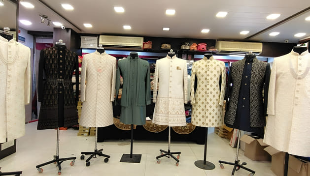 Demand for sherwanis soars during the wedding season, with shops flooded with new designs.