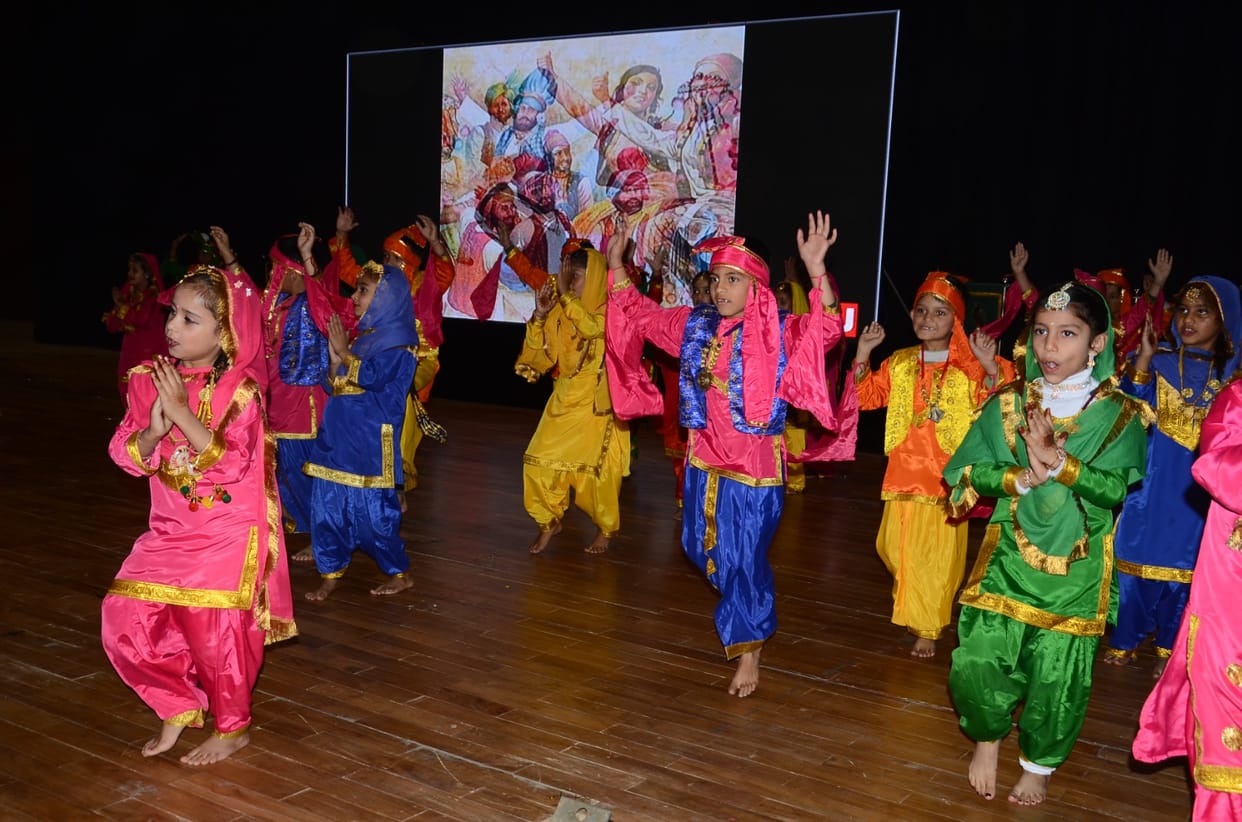 The first grade students enthralled the audience with their Pahari Naati and Bhangra performances.