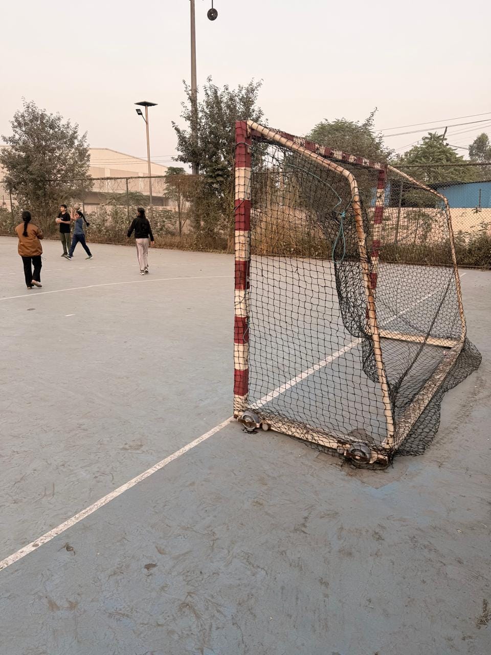 Dilapidated pole of basketball ground removed from government school