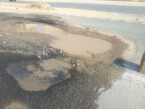 The new road of National Highway 148B is broken at many places, causing inconvenience to the people.