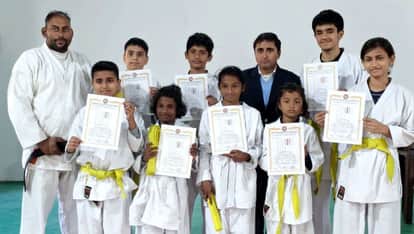Eight athletes passed the martial arts color belt exam.