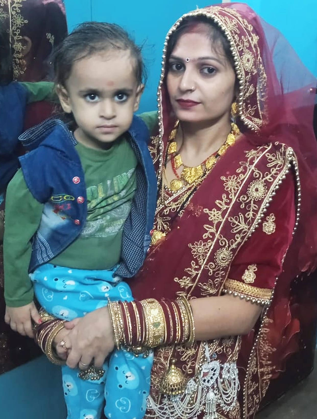 Mother and son riding a bike die after being hit by a truck, husband survives