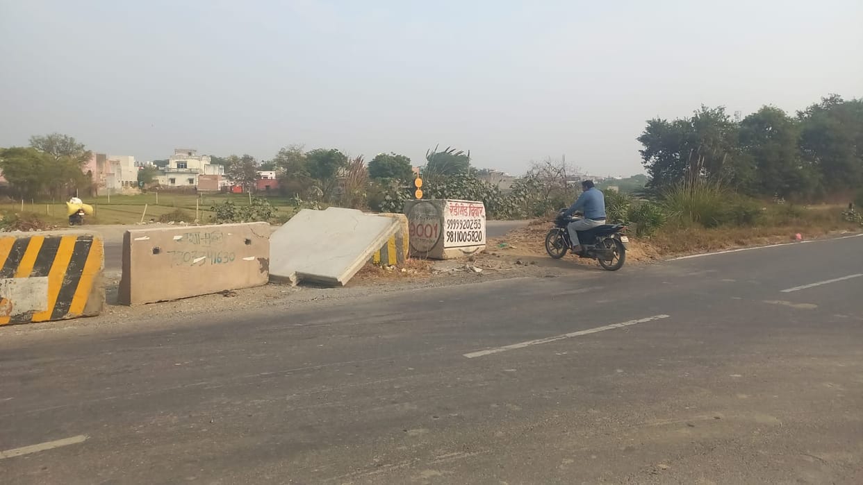 Illegal cuts and blurred white stripes on the National Highway