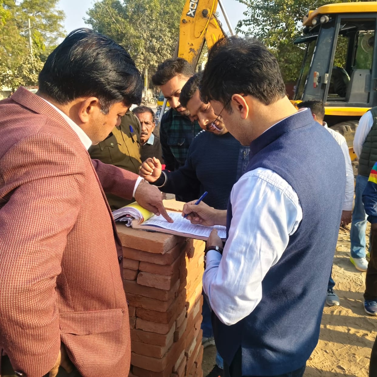 Occupying government land by dumping sand and gravel