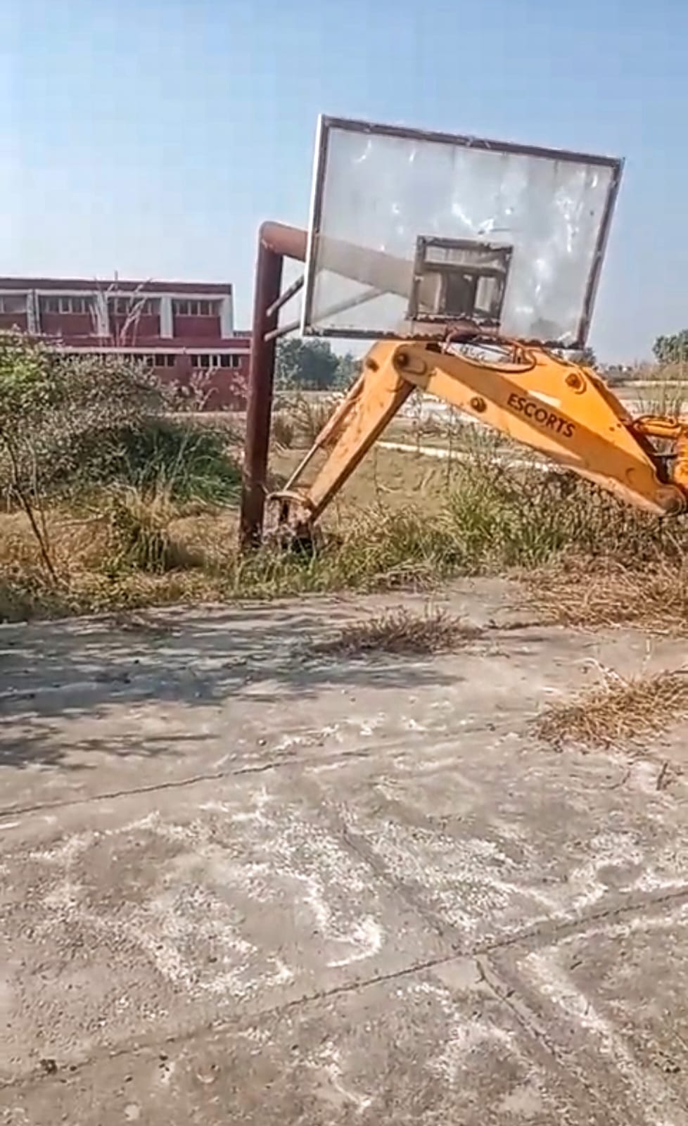 JCBs cleaned the Khatauli stadium, and removed the damaged basketball court.