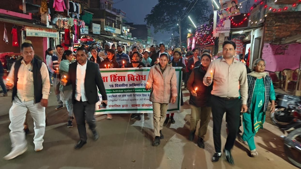 Awareness was created about violence against women by organizing a candle march.