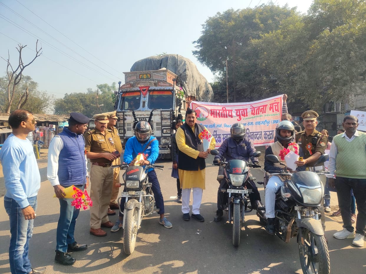 Presented bouquets of flowers to those who followed traffic rules