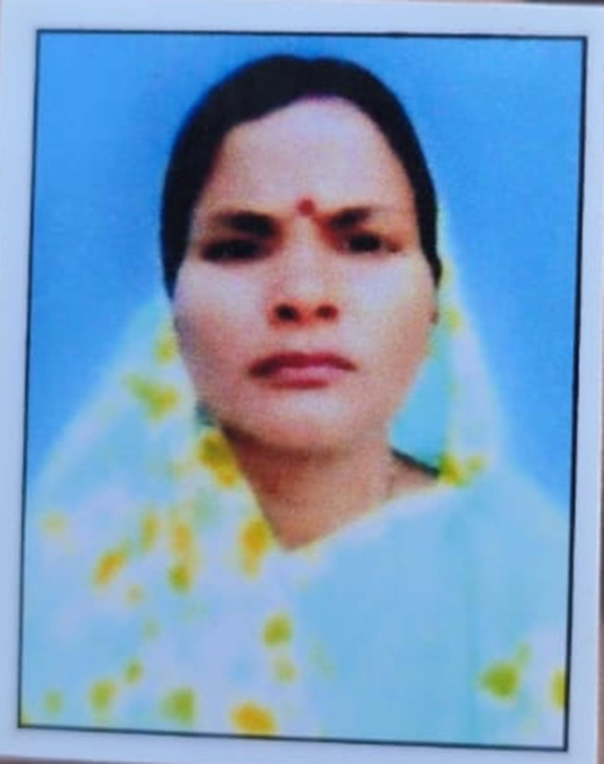 Woman killed, three injured in collision between two autos