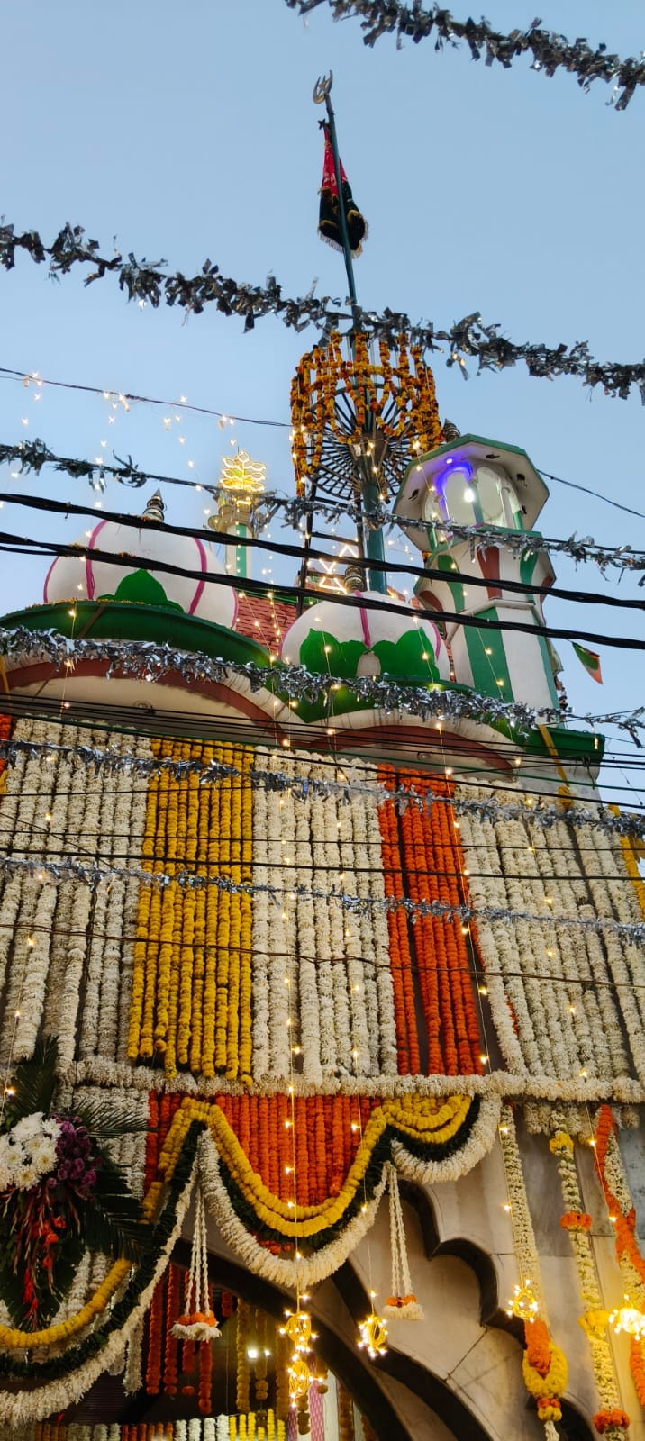 The annual Urs Mubarak begins with flag hoisting and fireworks at the shrine's entrance.