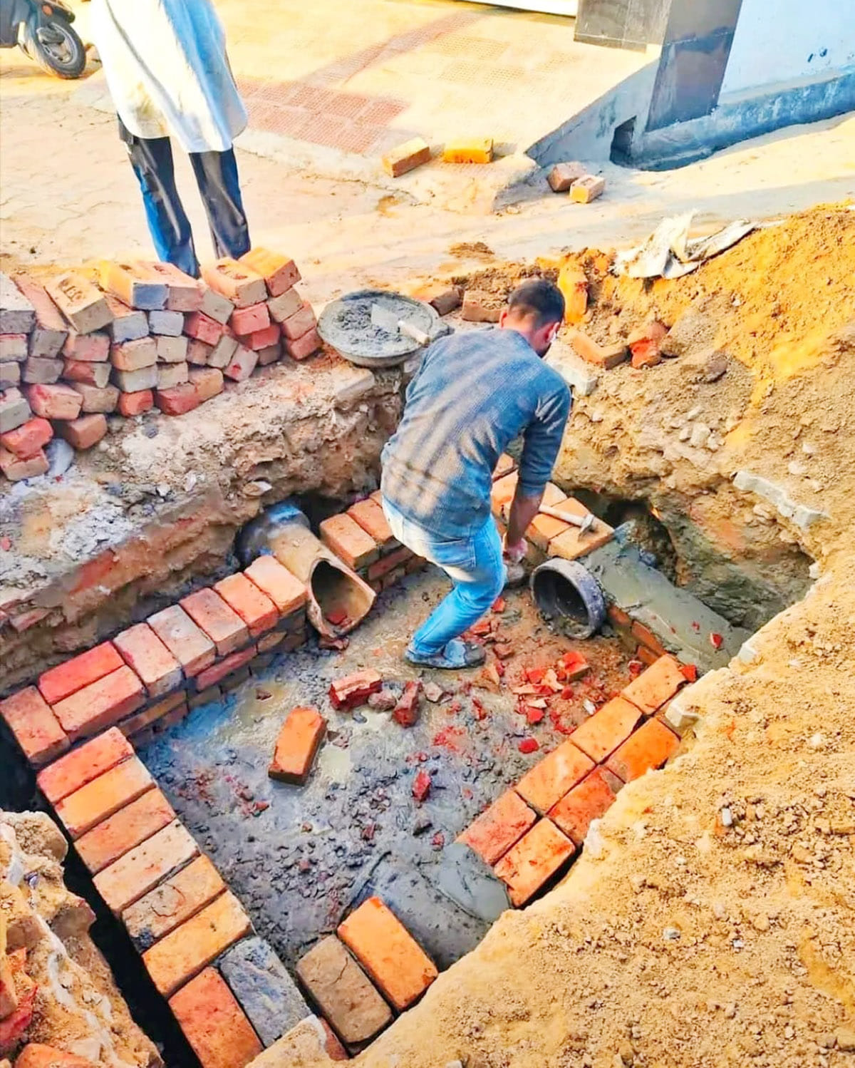 Allegations of irregularities in the construction of a new sewer line in Bhattu Kalan