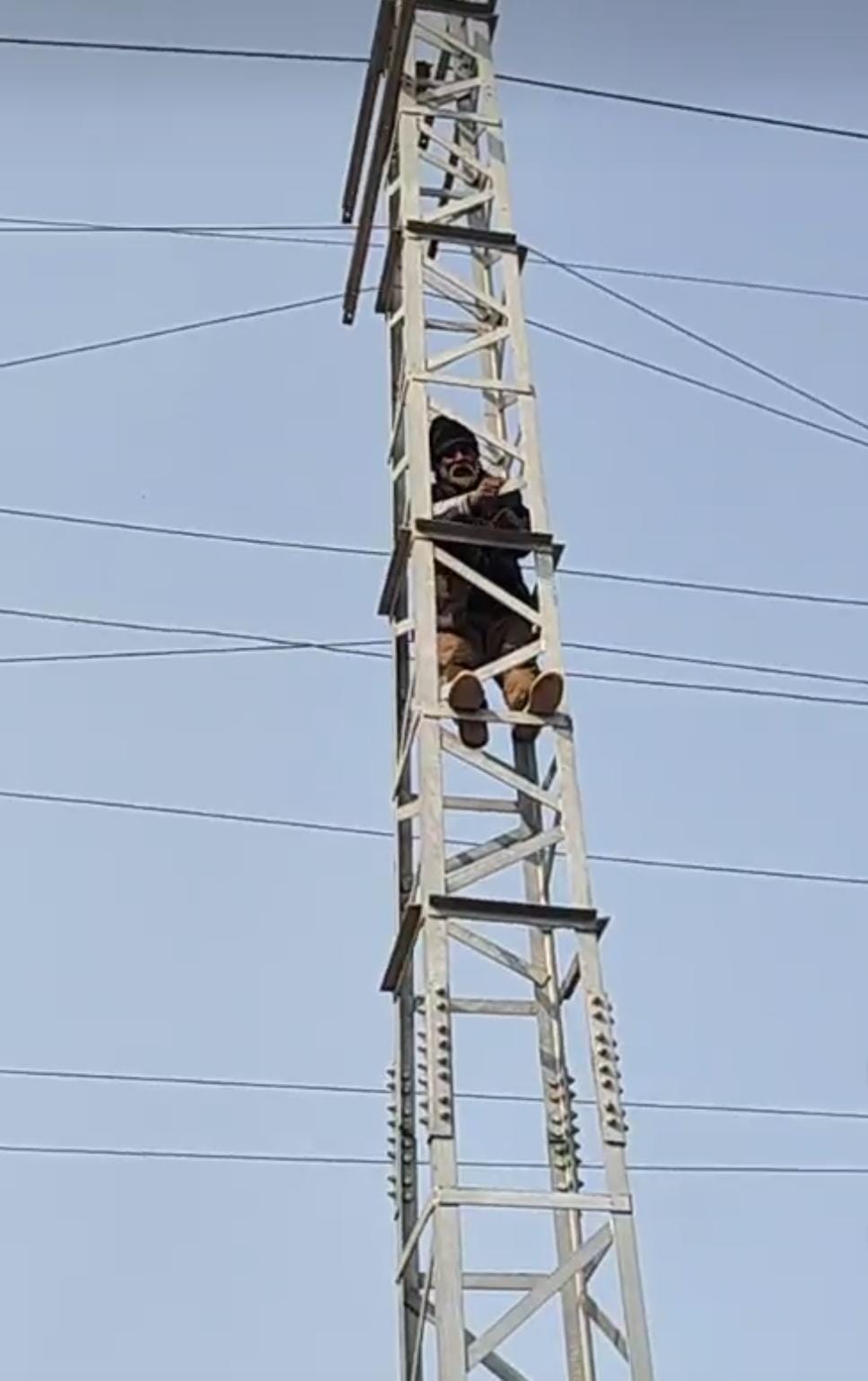 The young man climbed the tower again... a woman saved him.