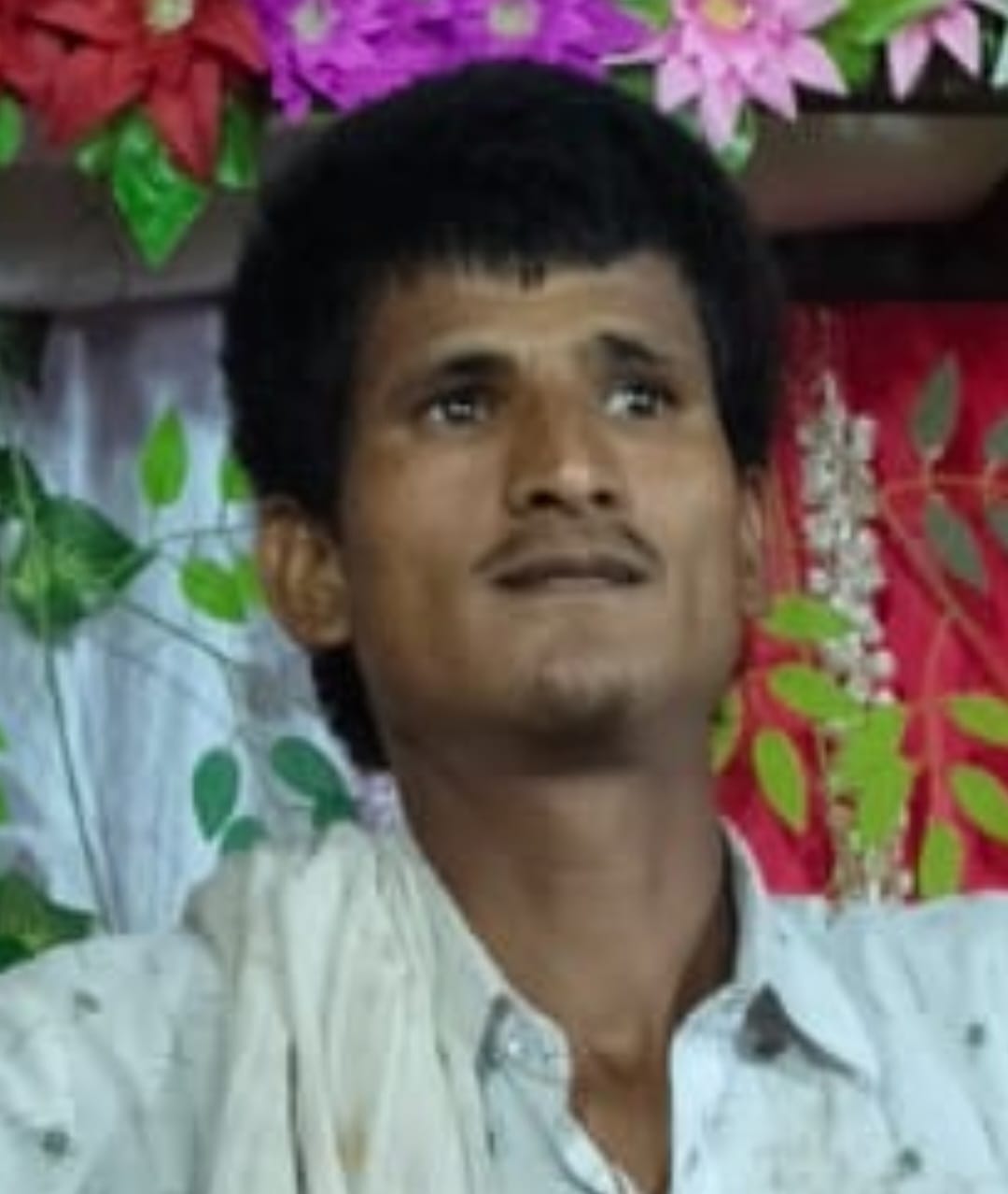 A young man was found hanging in the garden and died.