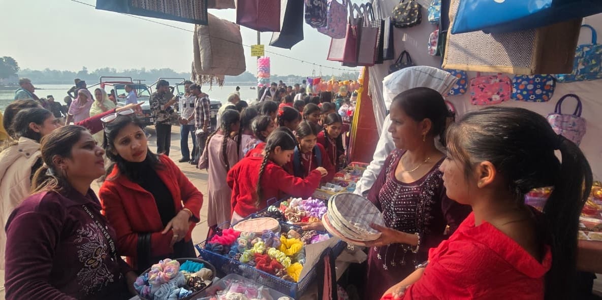 Women arrive at craft fair with jute bags and other products