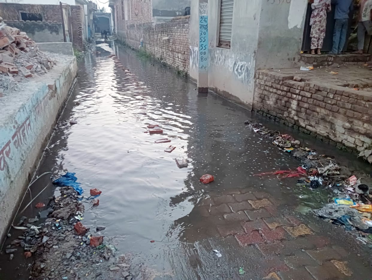 Water filled in the streets due to cleaning of the pond