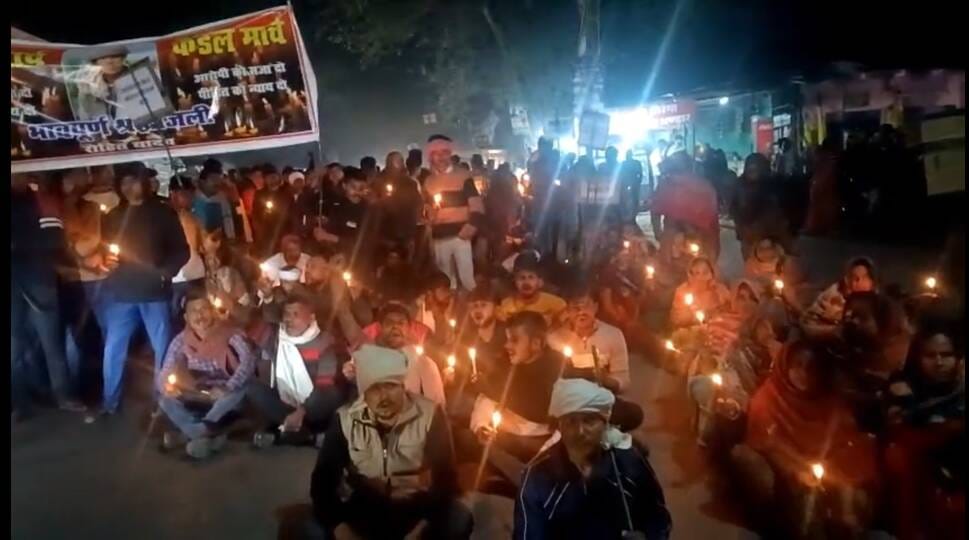 Tribute was paid by taking out a candle march, slogans were raised in front of the police station.