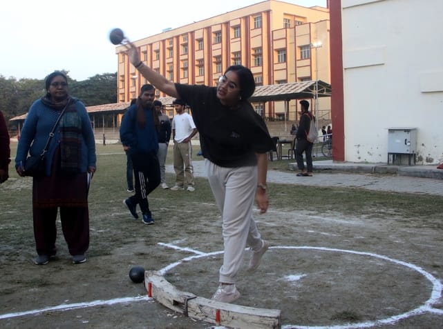 Teachers showed their strength in running and shot put.