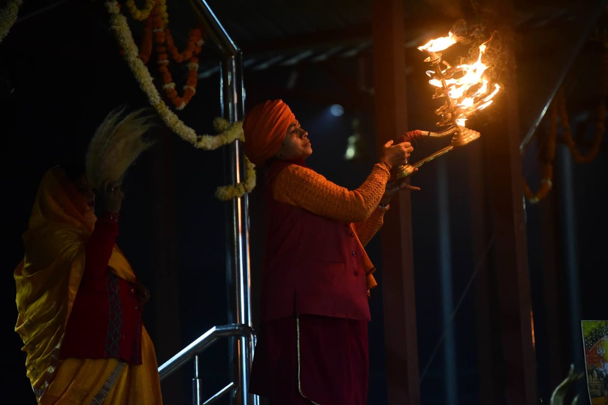 The coast is decorated with flowers and the grand aarti is performed.