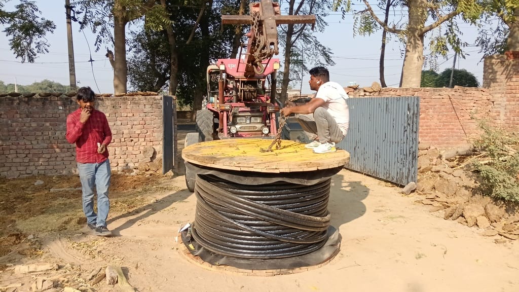 Work on shifting power lines continues, providing relief from wires running through rooftops