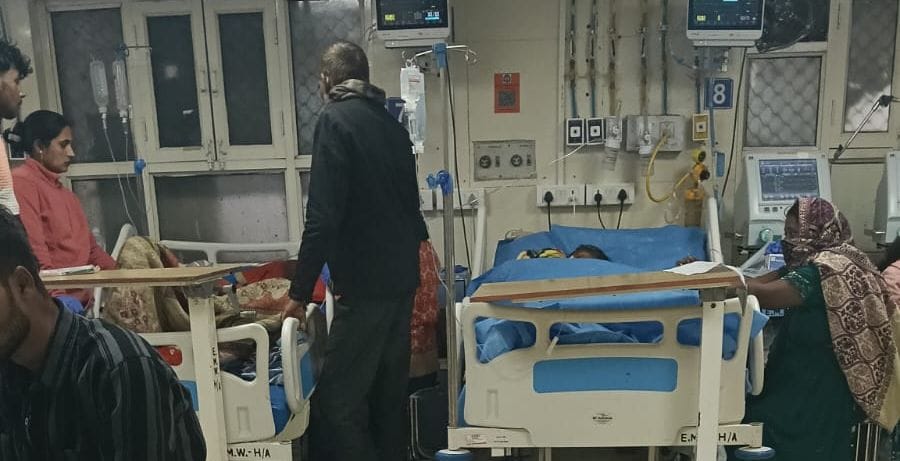 Staff and attendants walking around in ICU wearing shoes