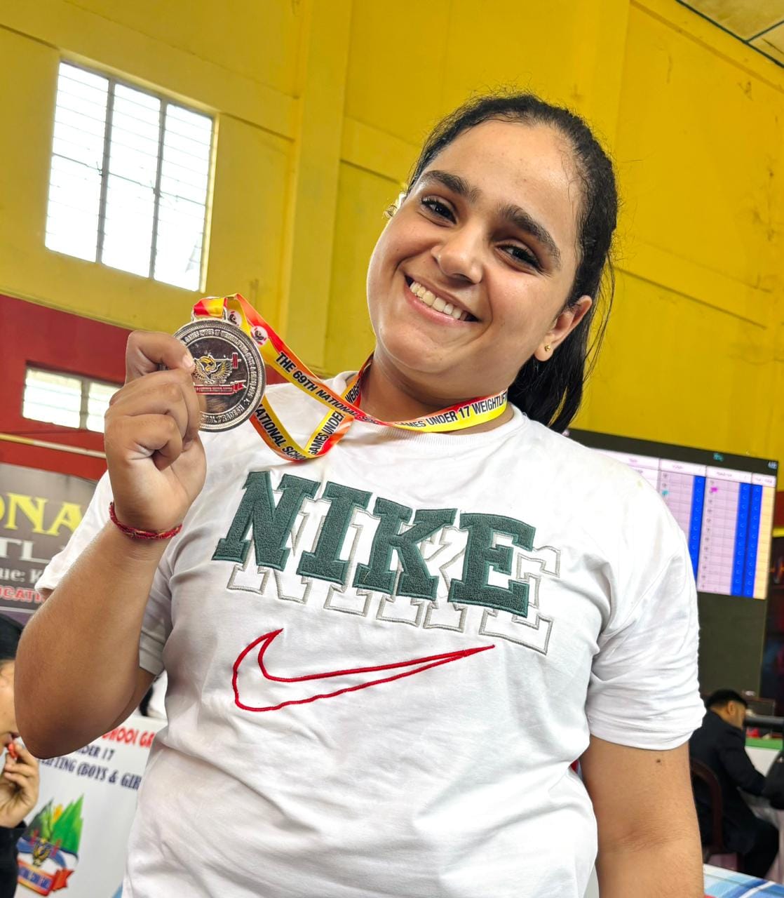 Lifter Miral achieved success through hard work