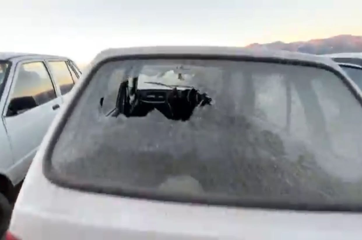 Miscreants broke the windows of six vehicles in Theog.