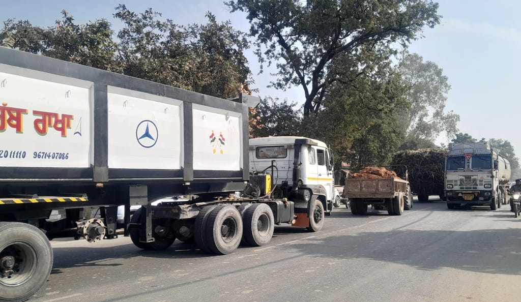 Traffic jams are being caused by the movement of overloaded dumpers and trucks, causing inconvenience to people