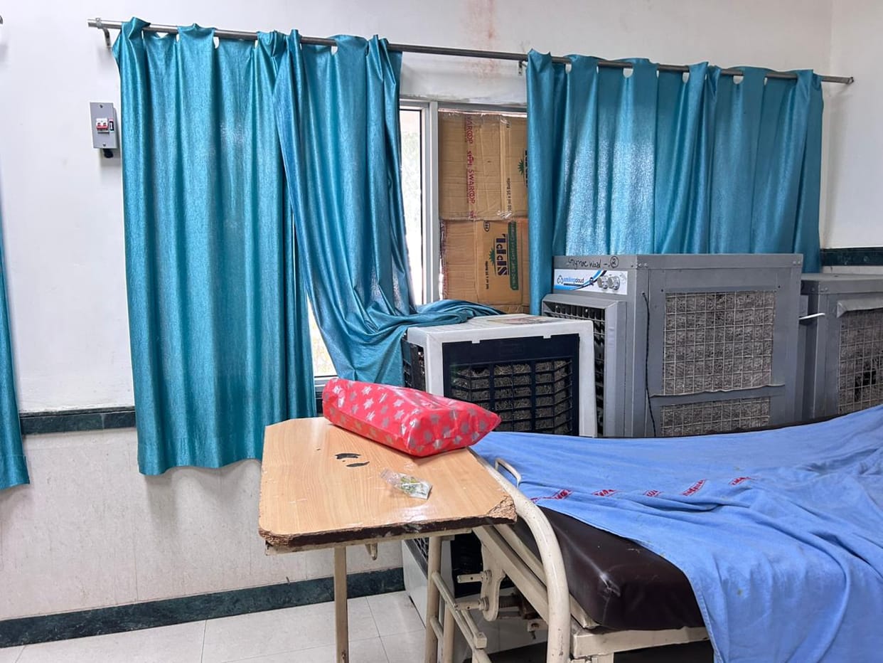 Shivering attendants covered the broken windows of the Civil Hospital with cardboard sheets.