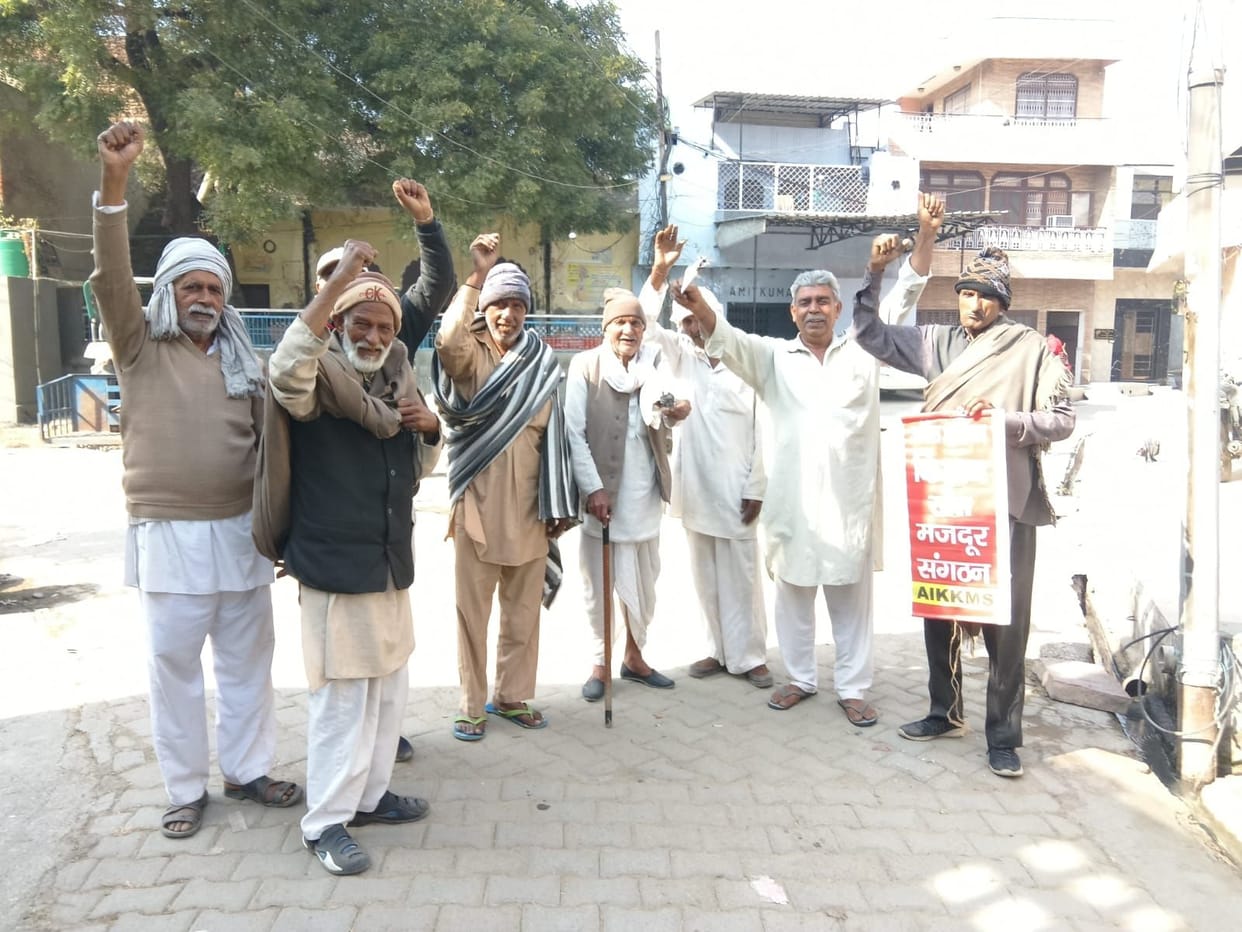 Farmers protested by burning copies of the electricity and seeds bills.