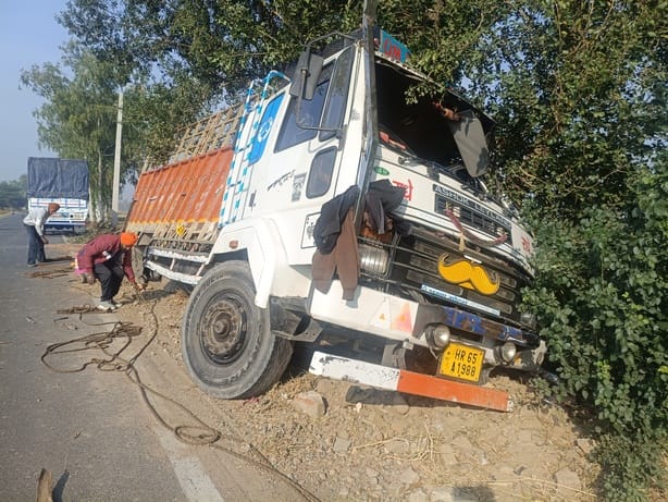 The truck collided with a tree while trying to avoid another vehicle