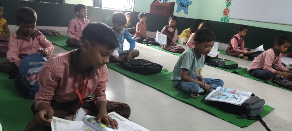 There is no furniture in the schools, children study sitting on the floor in winter.