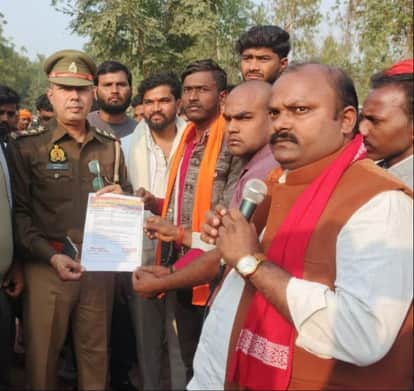 The main accused in the murder of the DJ operator's father is still at large, sparking protests.