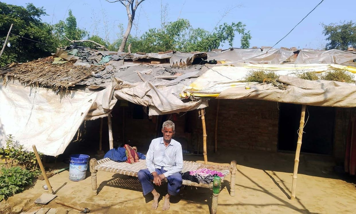 Did not get housing, couple living in hut