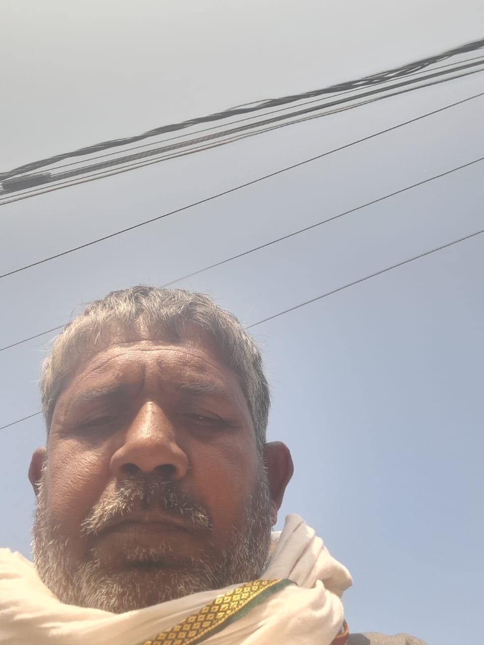 A confectioner who fell on the road after being hit by a bike was crushed by a dumper