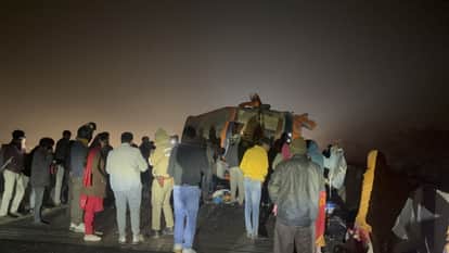 Bus hits bridge railing, overturns, eight injured