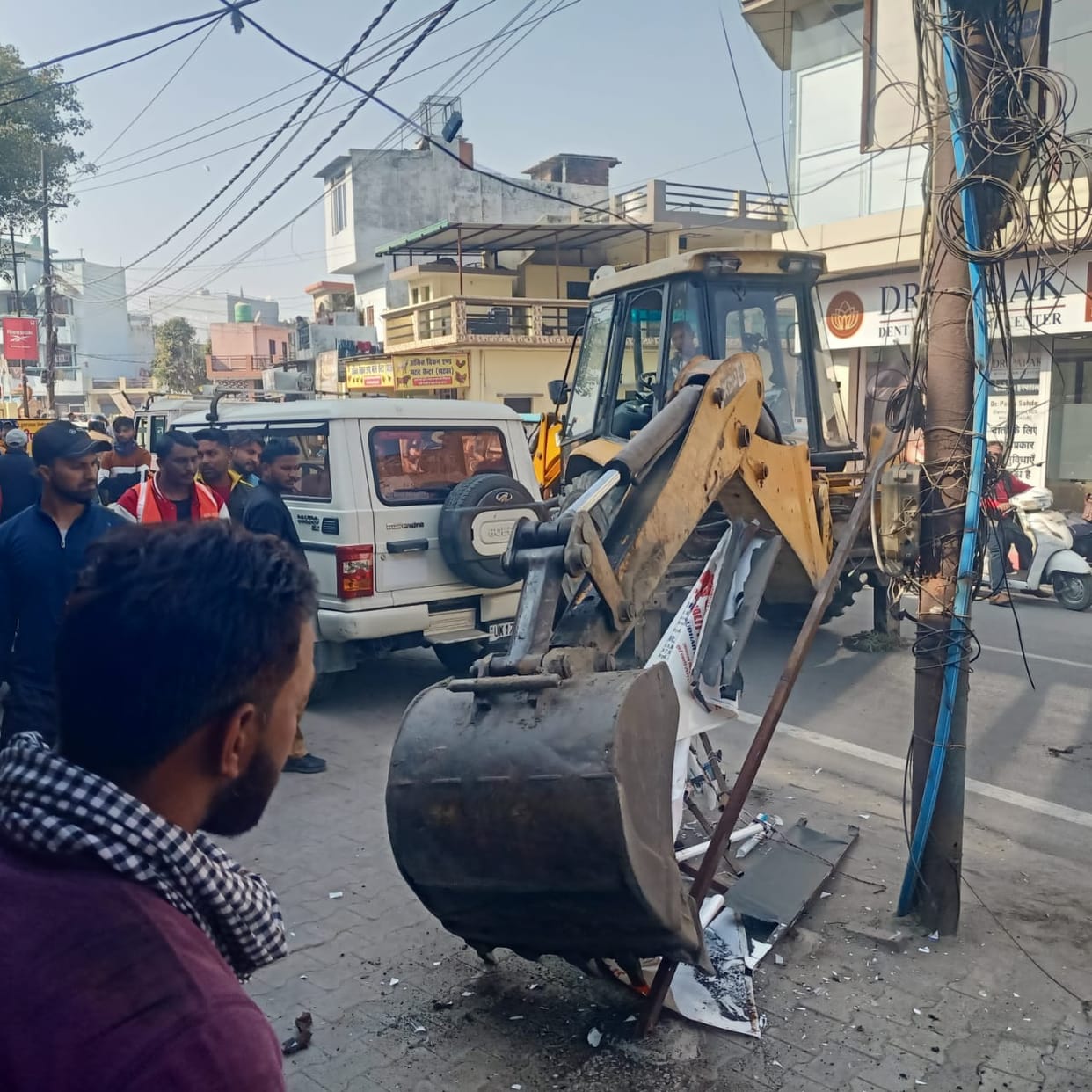 The corporation removed encroachment with a JCB, and there was a scuffle with the people