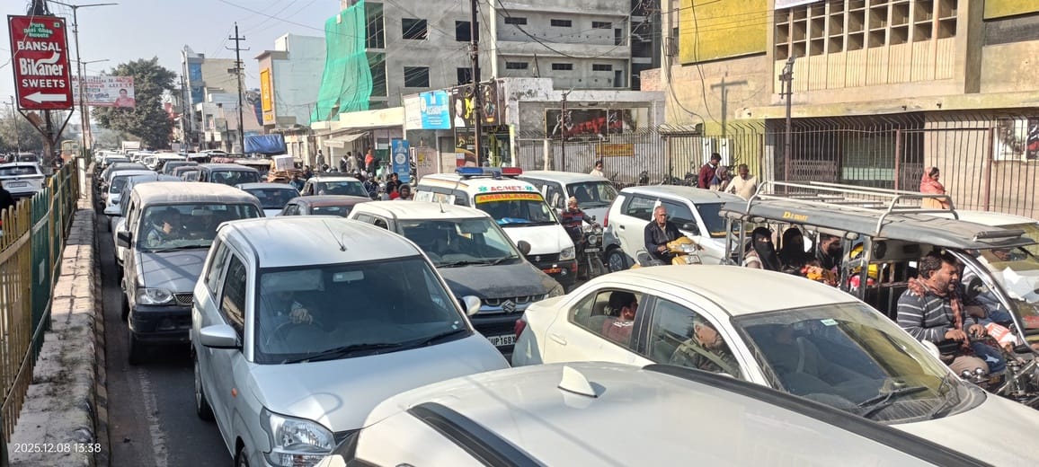 Traffic jams choke the city, vehicles crawl throughout the day
