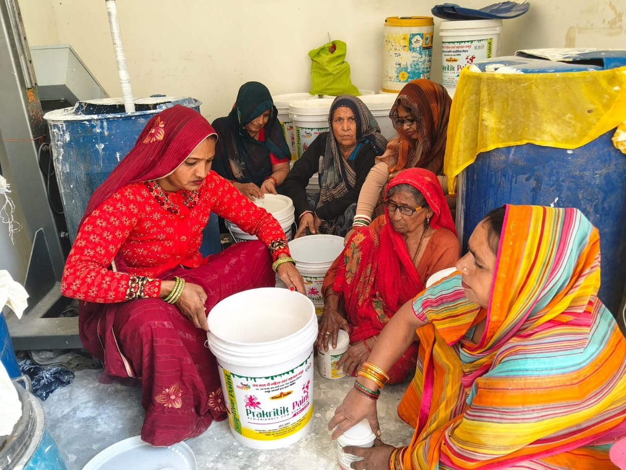 Women are making natural white paint from indigenous cow dung.