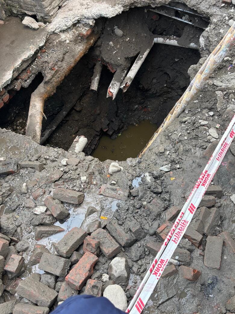 The choked sewer line has caused problems for the people of Gandhinagar.