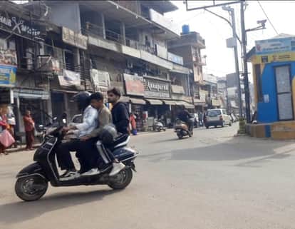 triple riding on bike