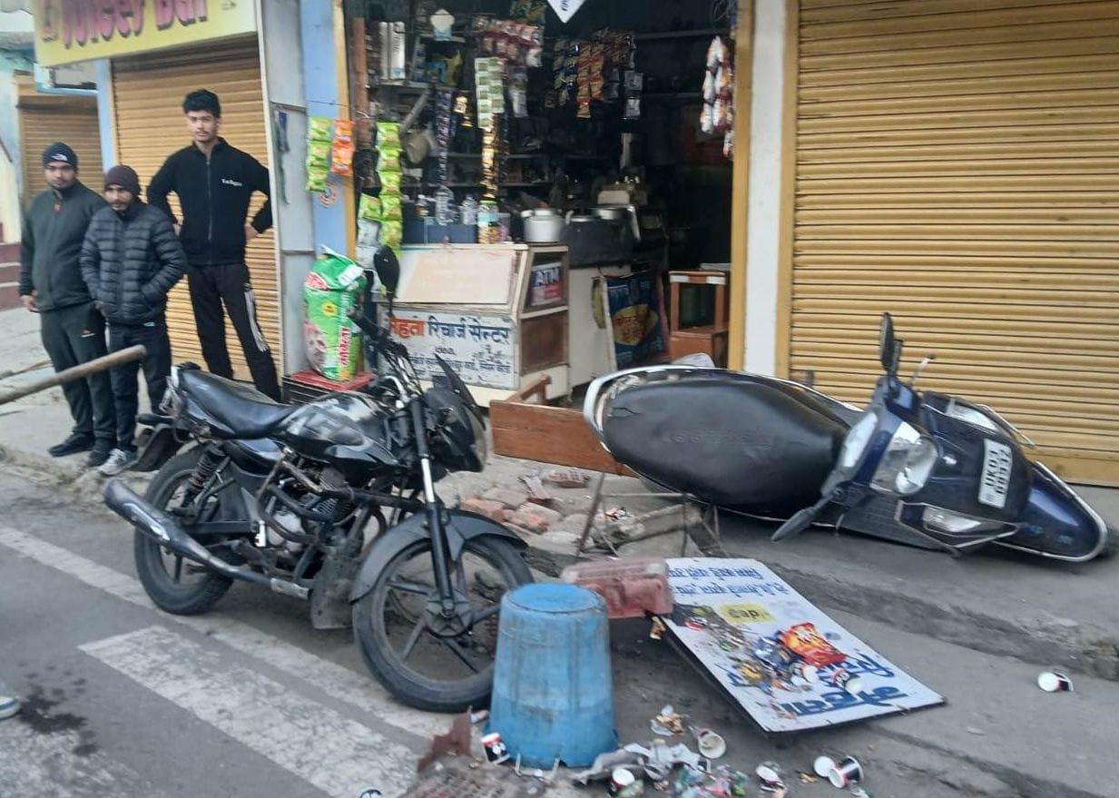 A minor scooter rider entered a tea stall along with his scooter.