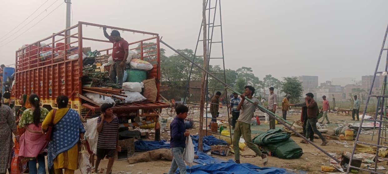 Shopkeepers busy packing up goods
