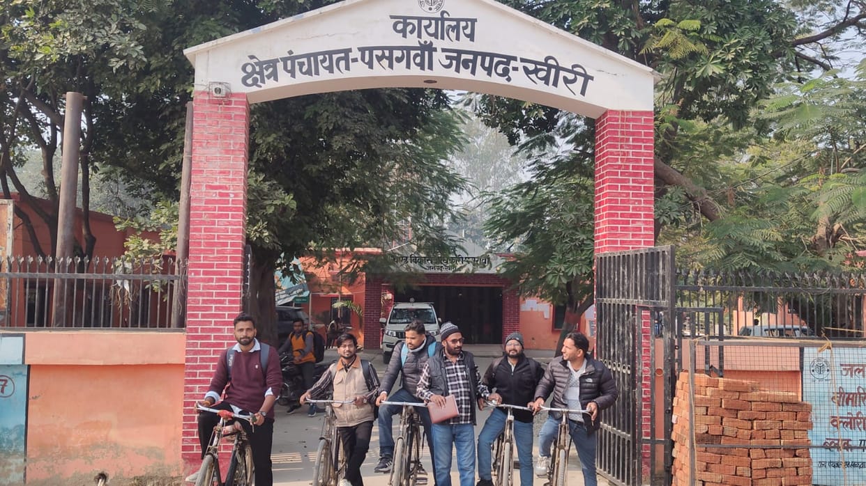 Gram Panchayat officer arrived on a bicycle wearing a black band