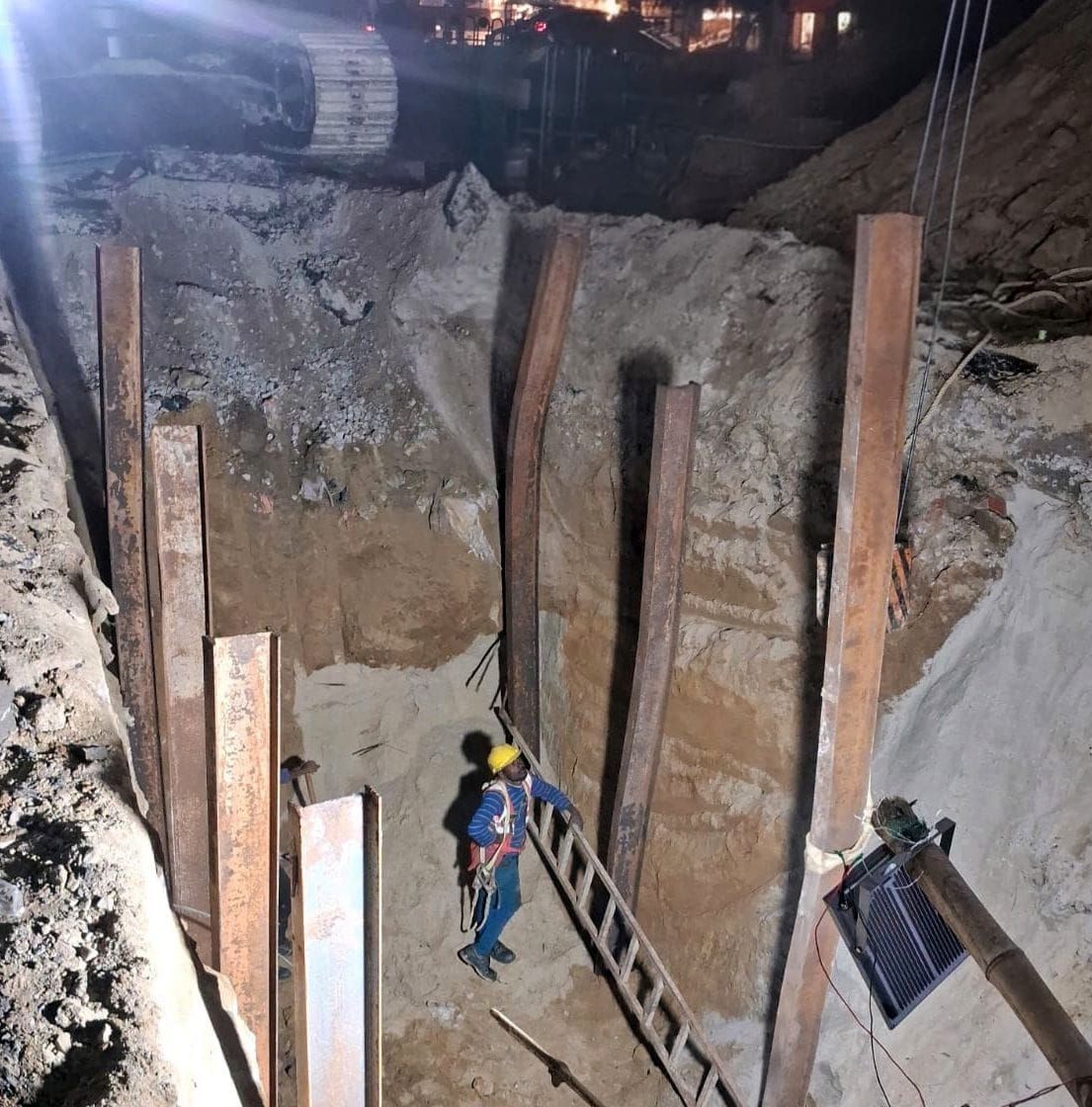 After four months, repair work begins on the collapsed road near the crooked culvert.