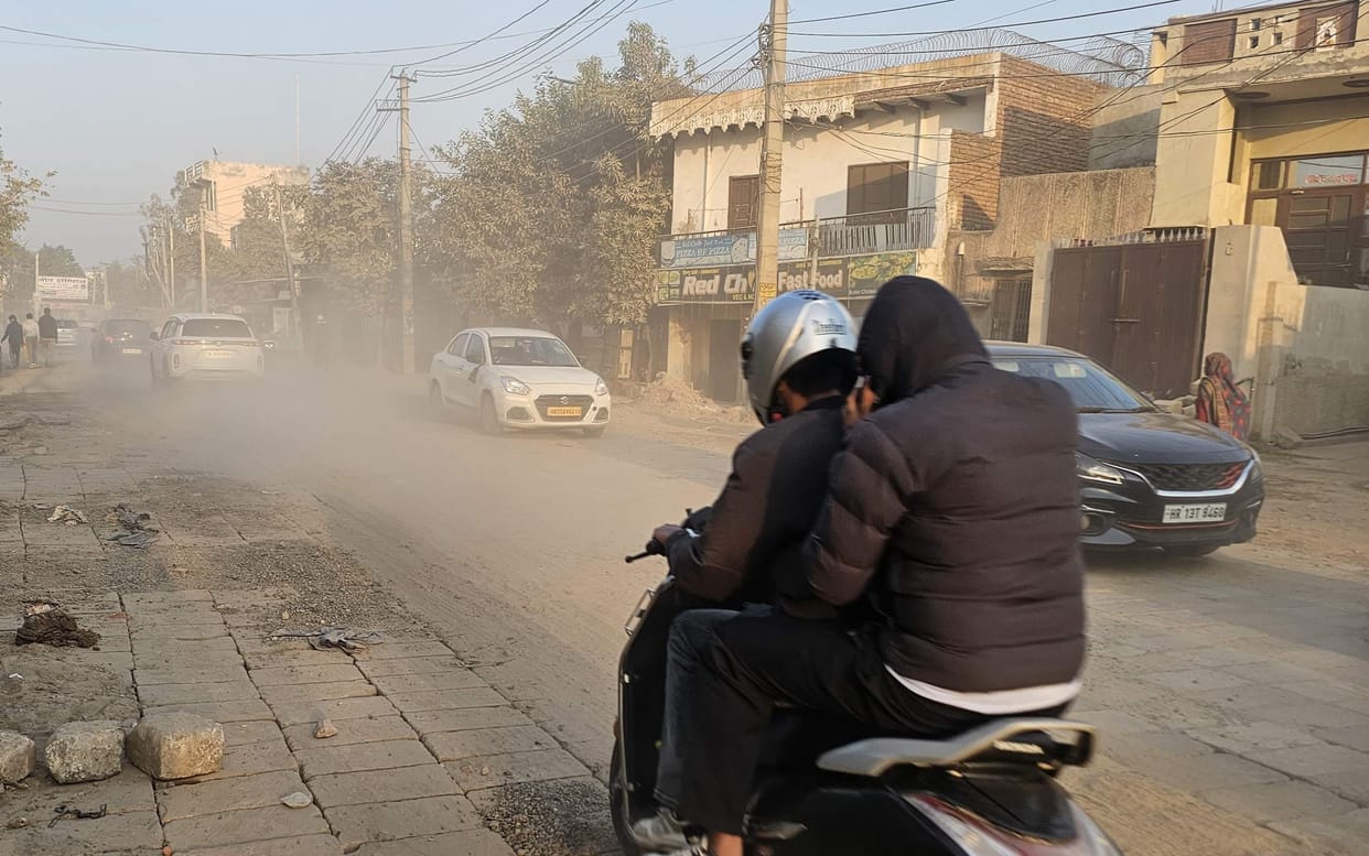 The road gets damaged after being built... villagers are troubled by the flying dust.