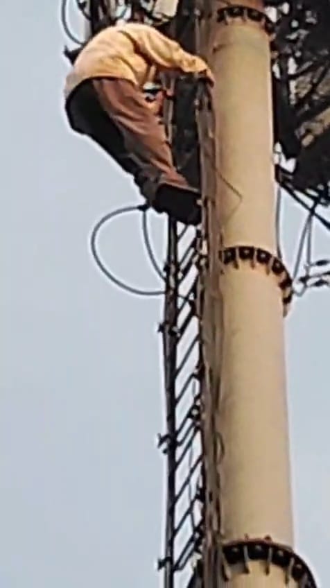 An elderly man, troubled by radiation, climbed a nearby tower, leading to an hour-long high-voltage drama.