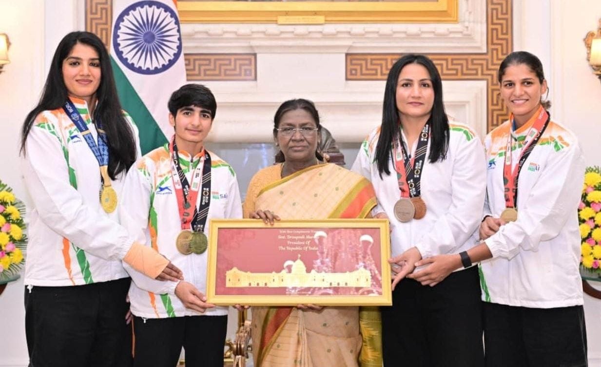 Four female boxers from Haryana honored by President Droupadi Murmu, their faces beaming with joy