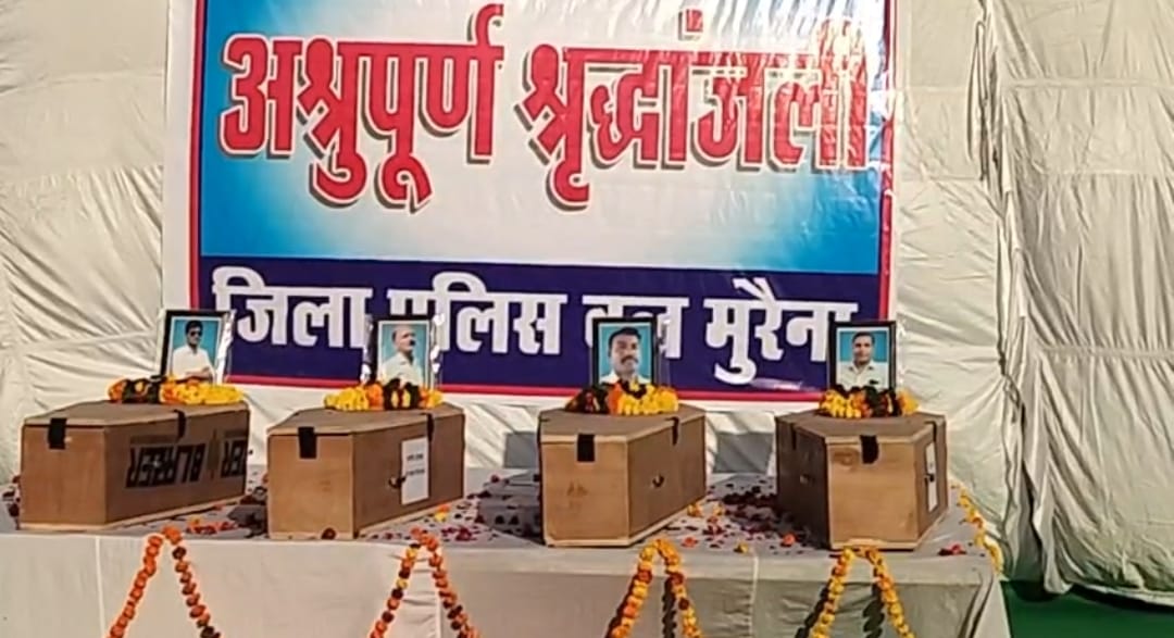 IG, DIG pay tribute to the bodies of four policemen who died in a Sagar road accident.