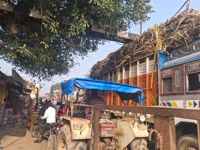 A speeding sugarcane-laden truck broke the railway gate, causing traffic jam.