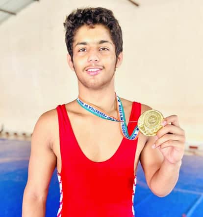 Wrestler Kush Gulia from Purkhas won a silver medal at the National School Games.