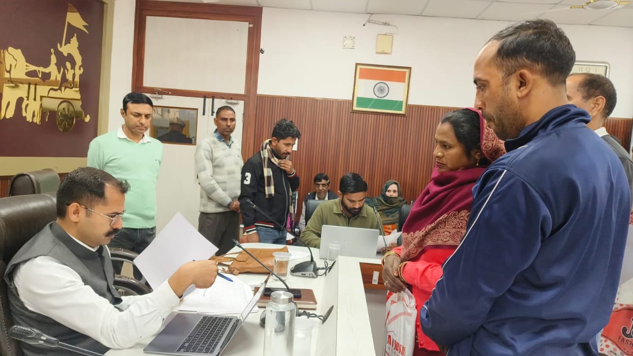 The Deputy Commissioner listened to the problems of the people in the camp.